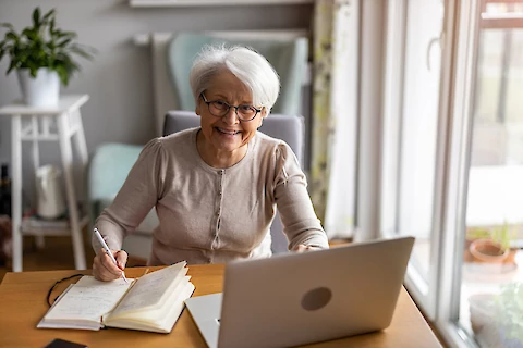 Clean home office workspace with laptop